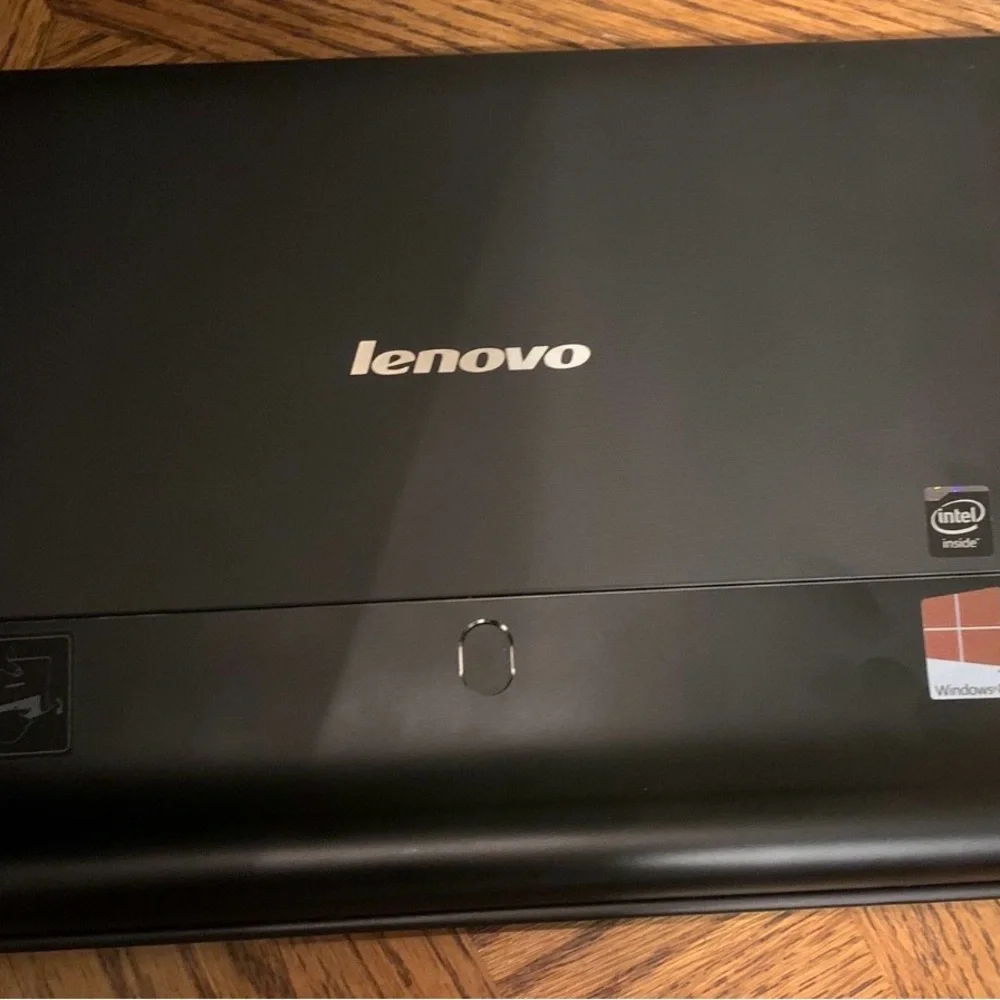 Lenovo Black Laptop with Silver Logo